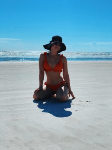 an photo of Lexie A, in a red bikini